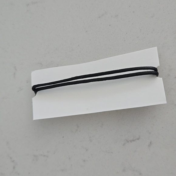 Brand new never used CHANEL bracelet gold bottle charm N°5 adjustable black cord - Picture 4 of 6